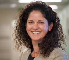 A close up photo of Lisa Richardson, smiling at the camera.